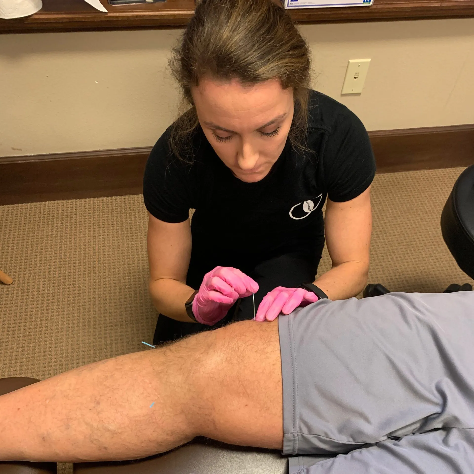 doctor adjusting patient