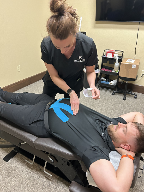 doctor adjusting patient