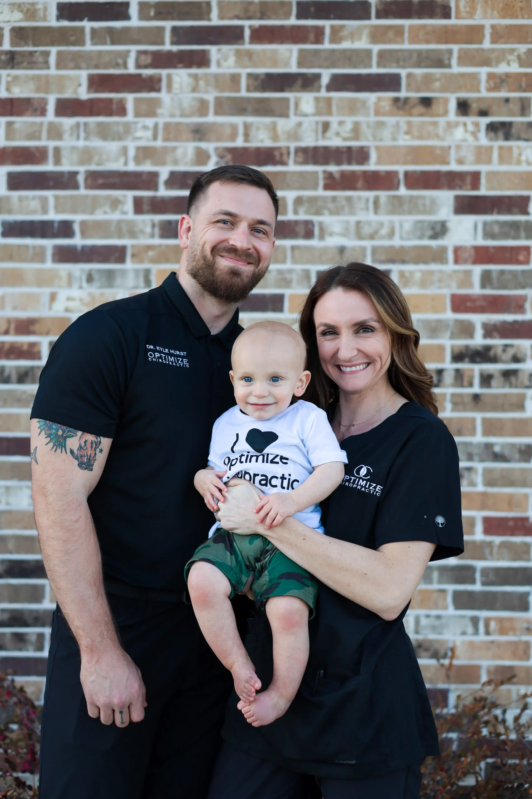 Dr. Kyle Hurst, Dr. Allissa Hurst and their son Briggs