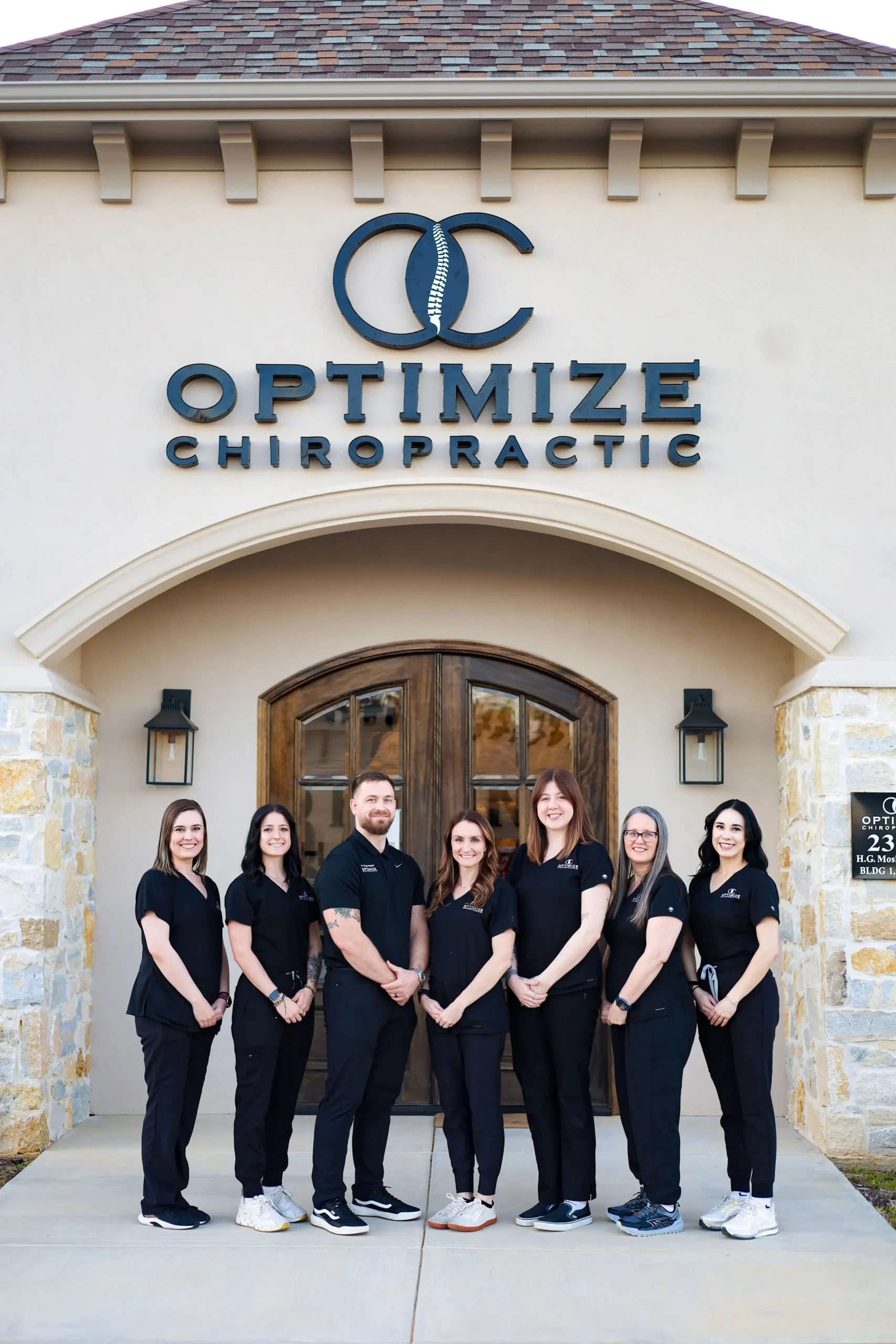 Optimize Chiropractic team in front of the Longview office